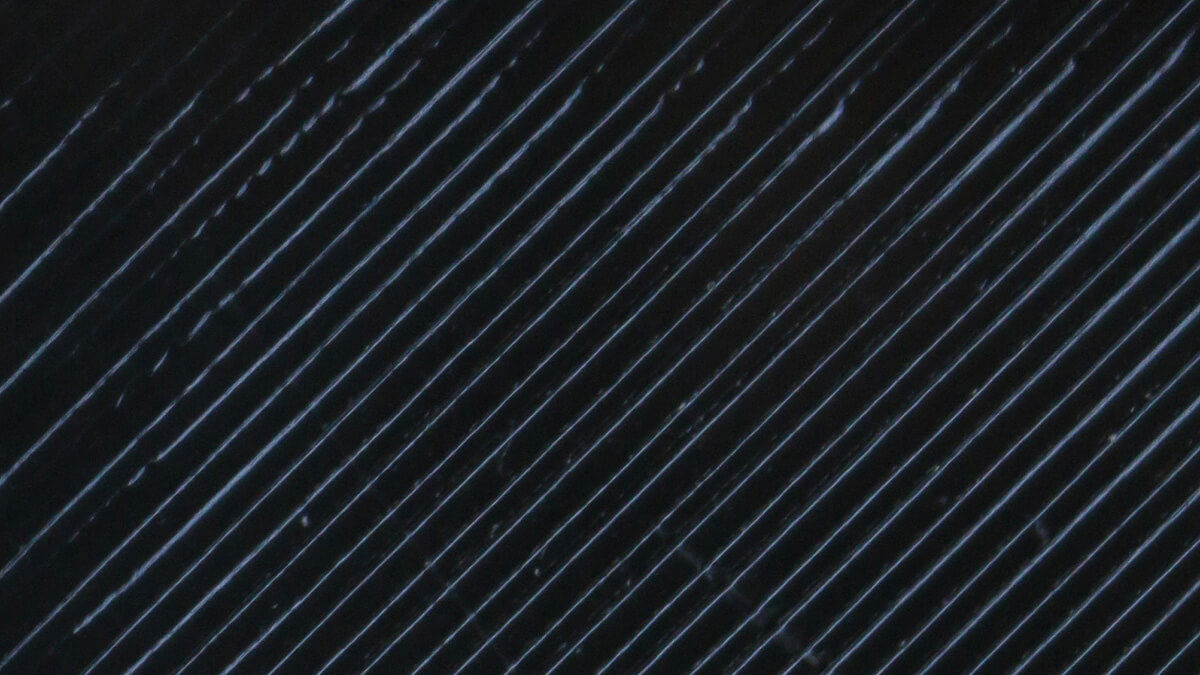 Nahaufnahme der QIDI TECH PETG Filament Pigmentierung (PET G Filament schwarz)